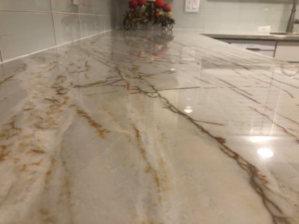 Close view of gold-veined marble slab