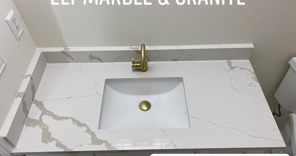 Calacatta quartz vanity with brass faucet, Sterling Heights